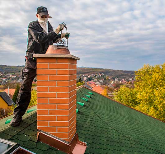 Chimney Sweeper Checking a Smoking Chimney