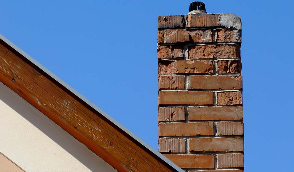 Cracks in chimney’s exterior masonry
