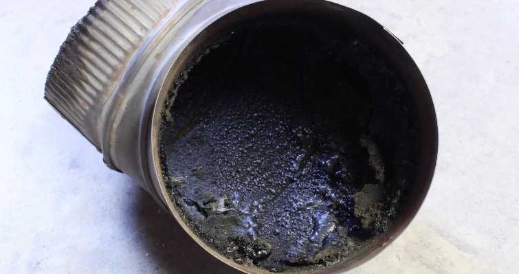 inside of pipe with creosote